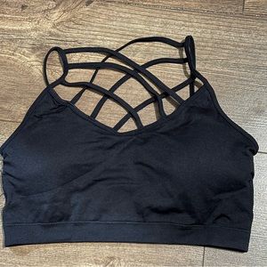 Funky black sports bra - size L/XL (crossing go across front)